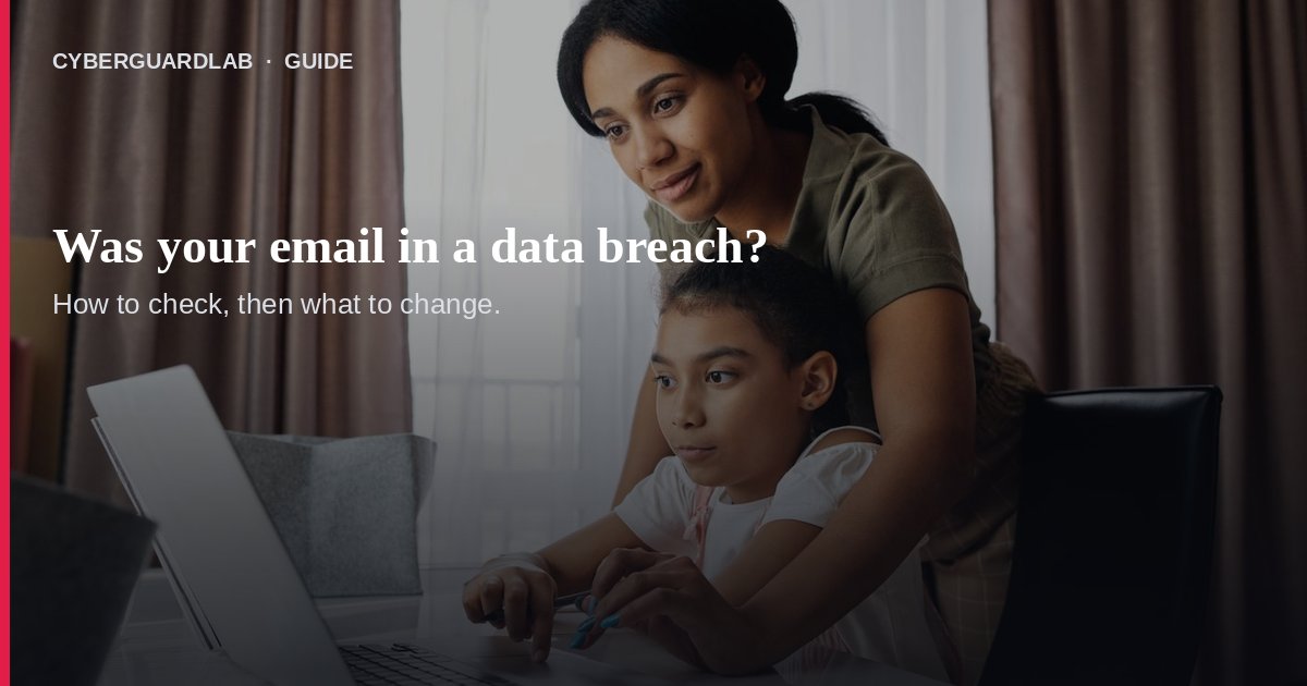Person checking an email address on a laptop